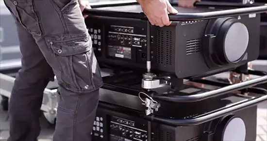 The robust DZ21K projector was chosen for its size (and ability to be easily stacked), resolution, remote control capabilities from a distance, and the fact that this projector is so energy efficient.