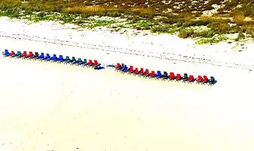 Waiting for a beach party and nobody came. Shot from a fast-moving chopper.